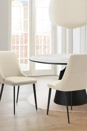 Genesis Upholstered Dining Chair in Beige Faux Leather with Black Meta Order Now