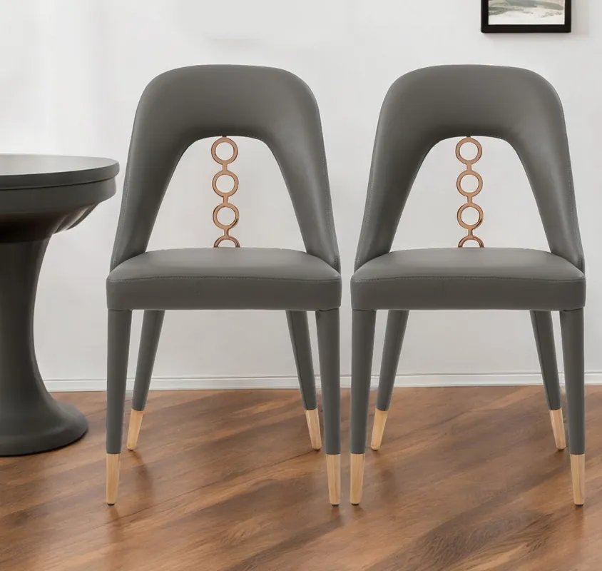 Set of Two Gray Faux Leather Dining Side Chairs With Rose Gold Accents Modern
